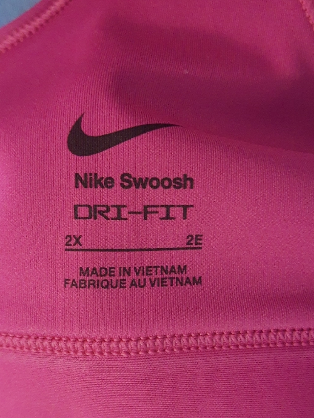 Nike Pink Racerback Sports Bra with White Swoosh - Picture 2 of 4